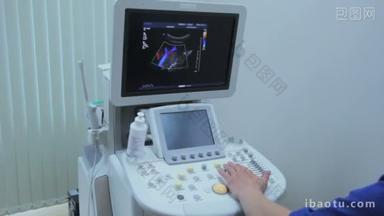 医生工作为超声机器上显示图形和肾动脉